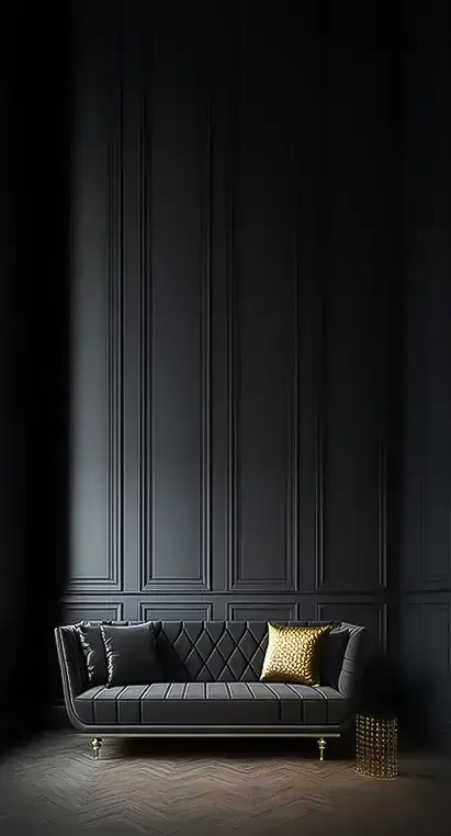 In a simple and elegant space, a black sofa adds a touch of sophistication and style to the room's decor.